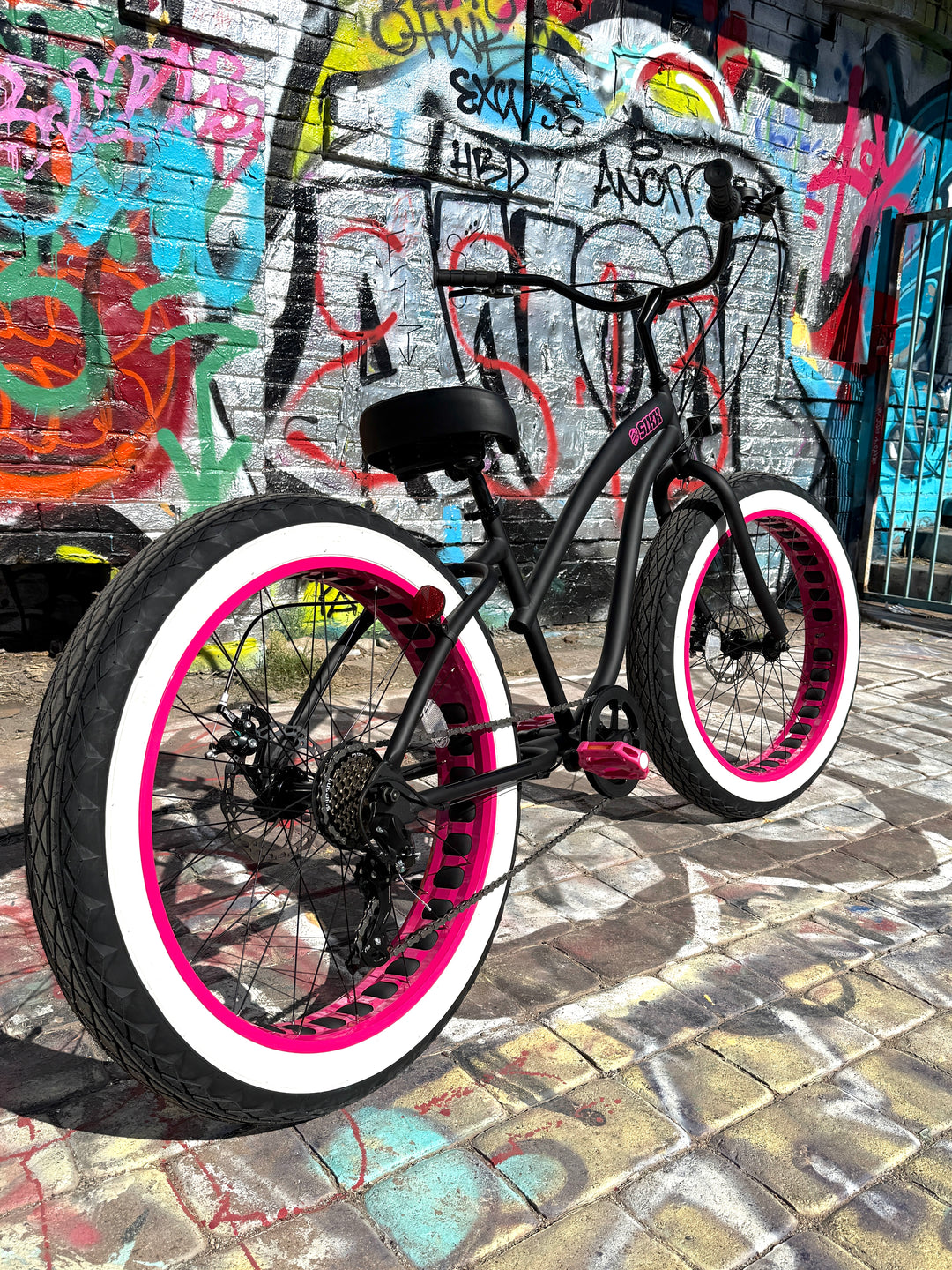 Ladies SIKK UFO 7 SPEED Flat Black Frame Pink Wheels Whitewall Tires