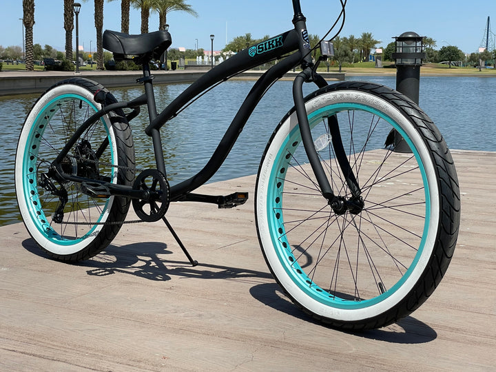 **Back In Stock** SIKK Wide Ride 7 Speed Ladies - Flat Black Frame Teal Wheels Whitewall Tires