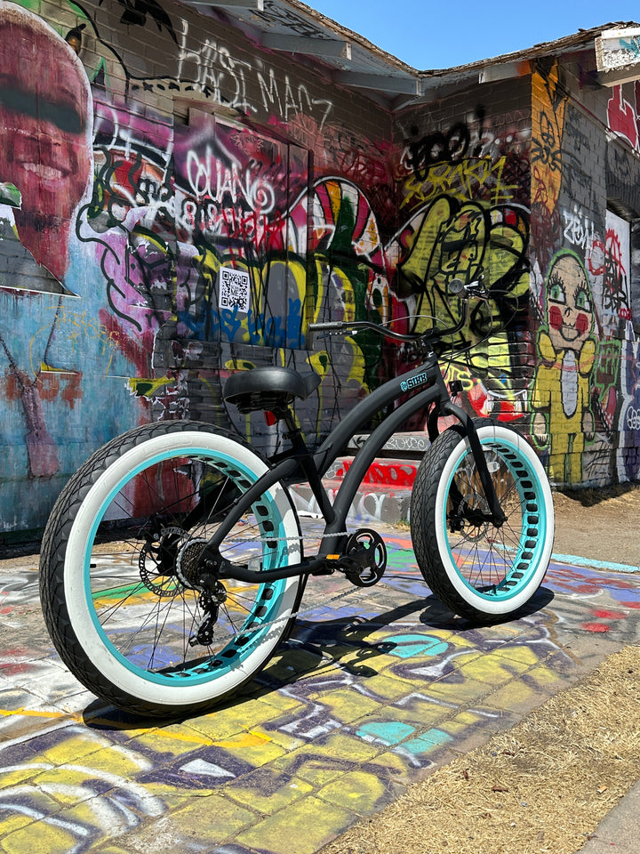 SIKK Ladies SS Aluminum Frame Flat Black- Teal 7 Speed UFO Fat Tire Cruiser - SIKK BICYCLES